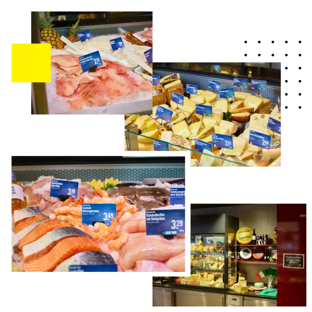 Frische Fisch- und K&auml;setheke im Supermarkt mit Lachs, Garnelen und gro&szlig;er K&auml;seauswahl auf Eis, Preisschilder sichtbar